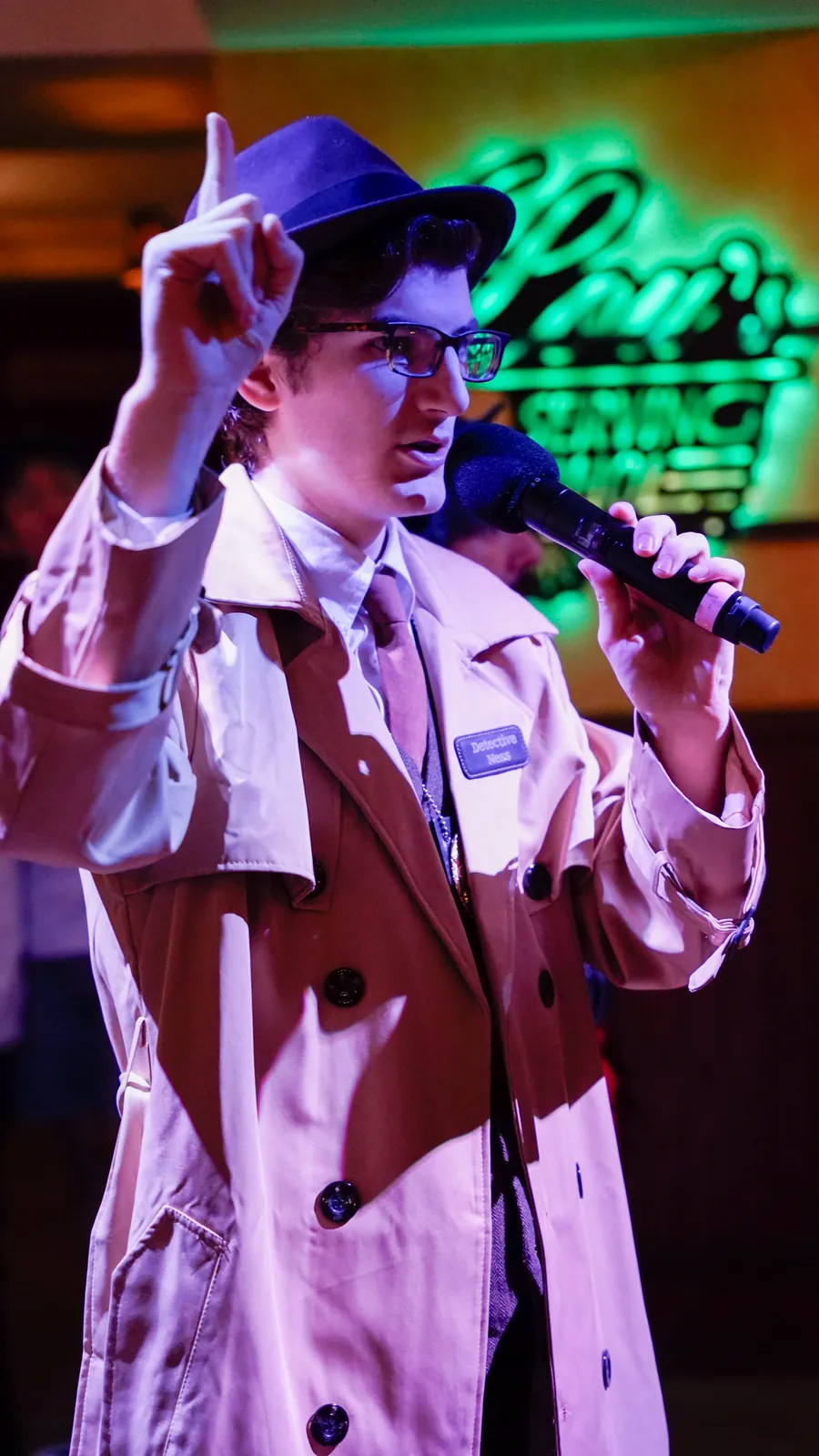 A Murder Mystery Company actor working the room at a Maine show